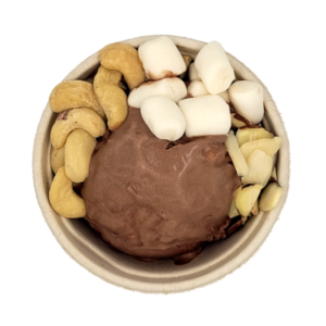 Scoop of rocky road ice cream with cashews, mini marshmallows, and almond slivers.